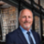 Eye-level view of a lawyer reviewing documents in an office