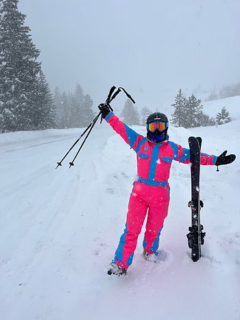 An empowered woman in the snow
