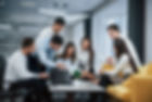 guy-shows-document-girl-group-young-freelancers-office-have-conversation-working.jpg