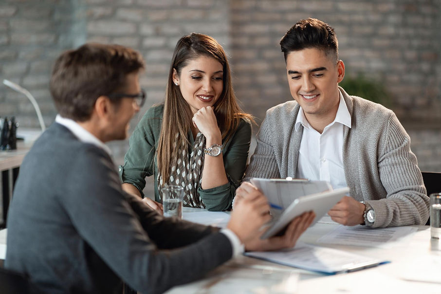 young-happy-couple-having-consultations-with-bank-manager-meeting-office.jpg