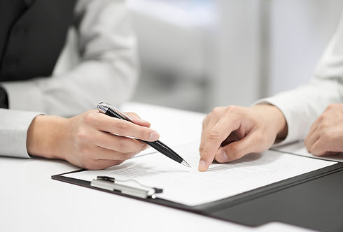 Pointing Pen And Finger On Document_edited.jpg