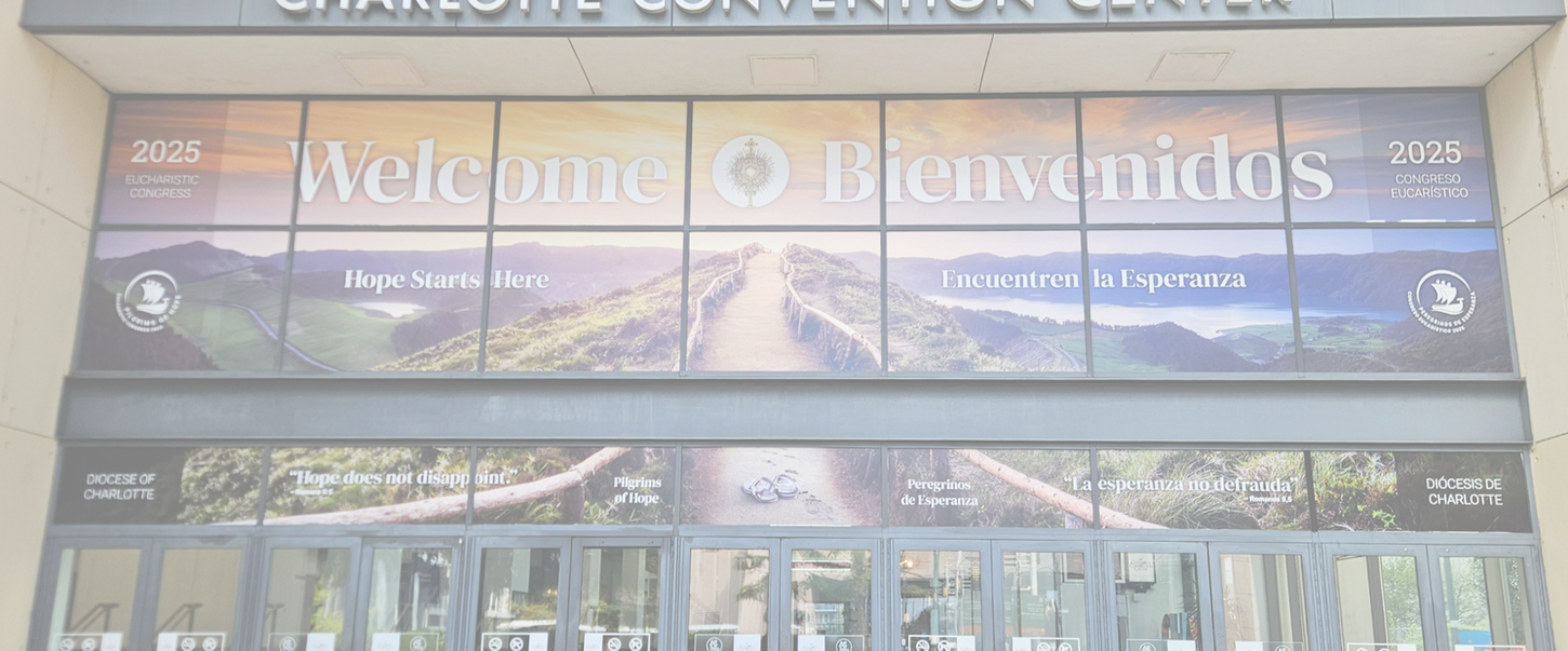 Sketchy Kid Designs window clings at the Charlotte Convention Center for the Charlotte Catholic Diocese Eucharistic Congress