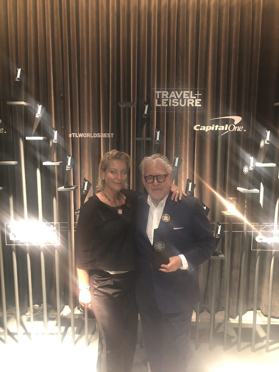 Anna with Six Senses CEO Neil Jacobs at the T & L Awards in 2019