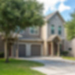 Woodgate Townhomes Exterior - Garage and Driveway