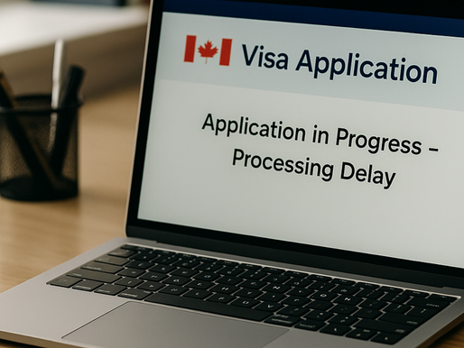 Open laptop on a desk shows a Canada visa application screen with the message “Application in progress, processing delay.” The article is Canada immigration backlog explained for new international students.