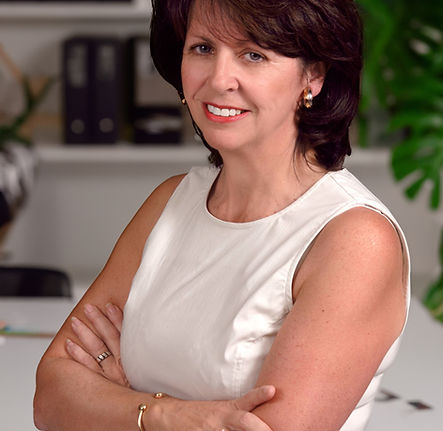 Lesley headshot office.jpg