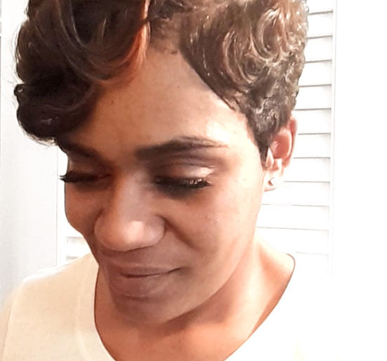 Short Pixie with color highlights styled by Kim Trent at Her Name is Beauty Hair Salon in Louisville, KY