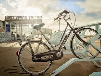 Public space bike parking solutions, custom bike parking systems, Bike shelter in The Hague, Bike parking near Scheveningen Boulevard, FietsParkeur bike parking standards, Urban bike parking design, Designing bike shelters for urban environments, Public bike parking solutions for coastal areas