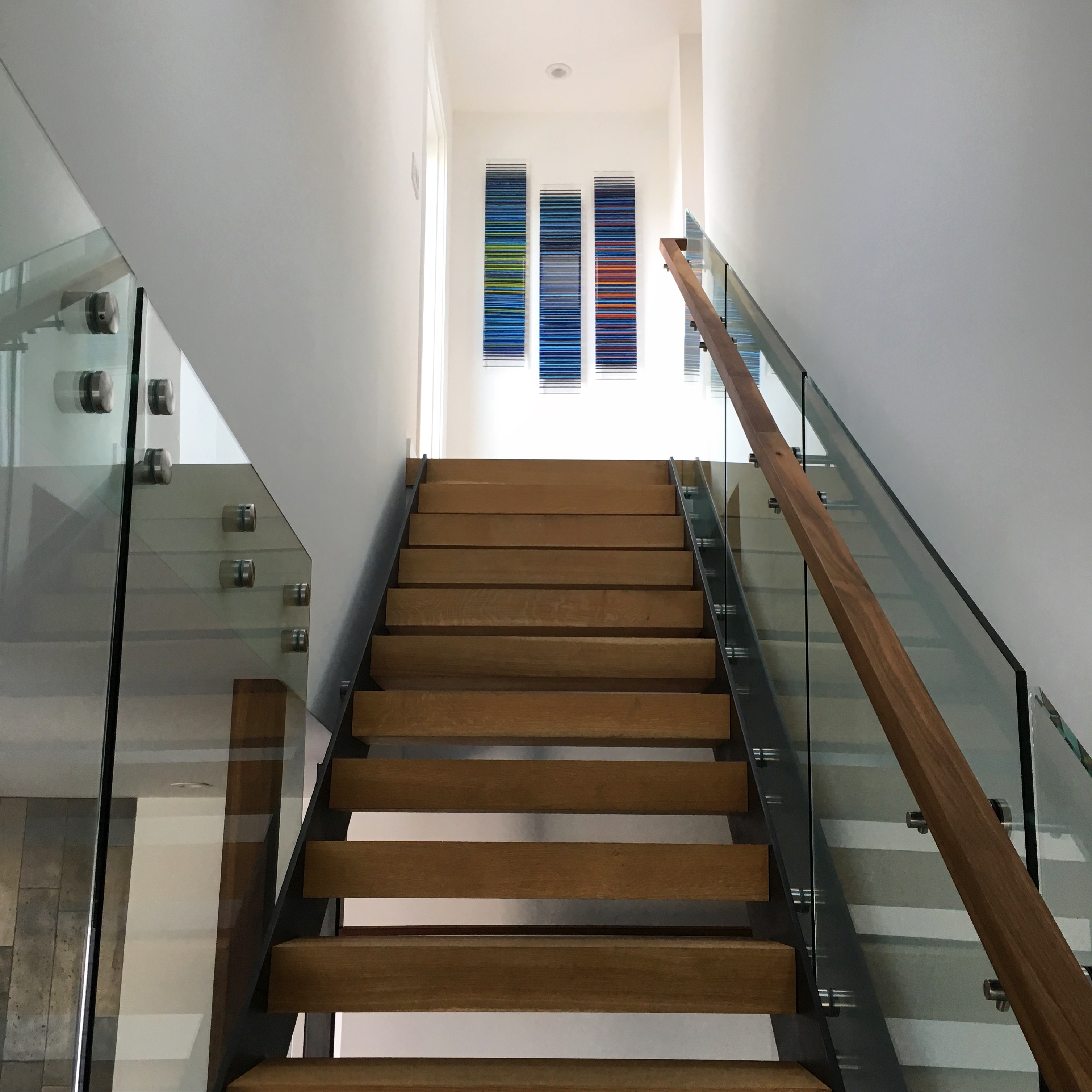 A set of three blue wall panels.