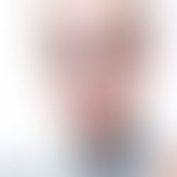 High key winter-themed headshot portrait of blonde woman. Studio portrait.