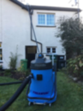Gutter cleaning in action on house