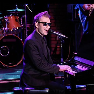 thumbnail_Phil Thompson Performing.jpeg