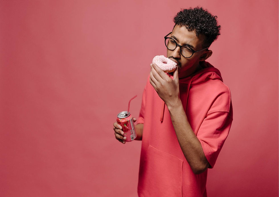 A man gorges on sugary food, putting himself at risk of Diabetes