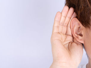 A woman listening out for something