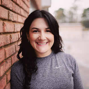 Smiling woman with dark hair