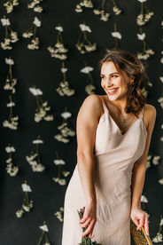 model smiling off to the side