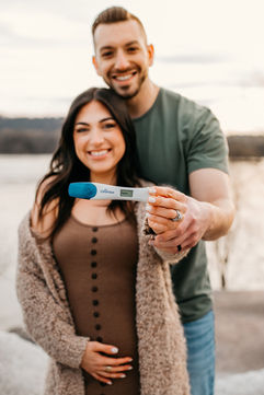 Dad and Mom showing pregnancy test