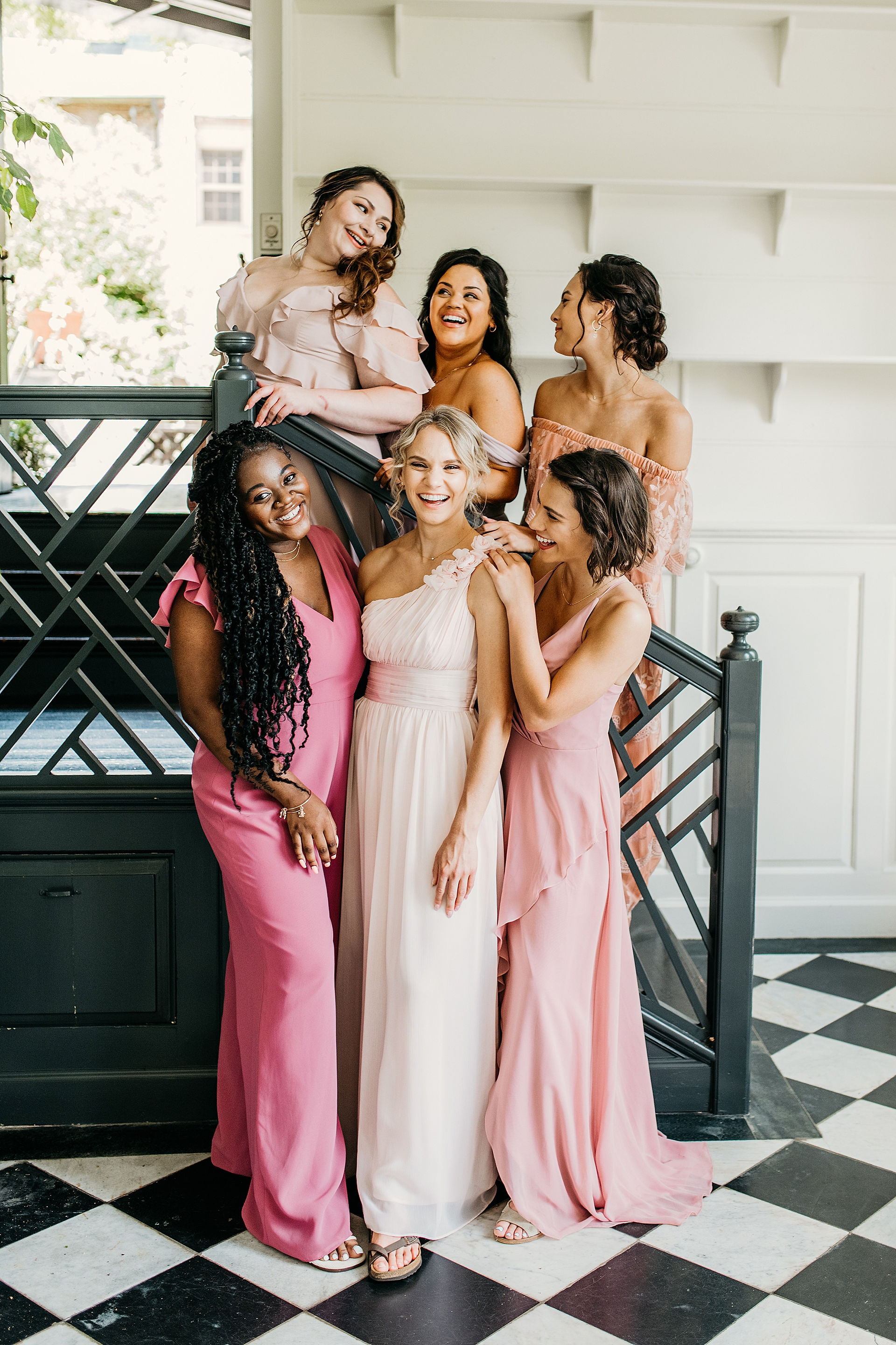 Bridesmaids on the staircase photo