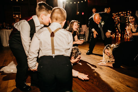 bride doing the caterpillar dance at wedding