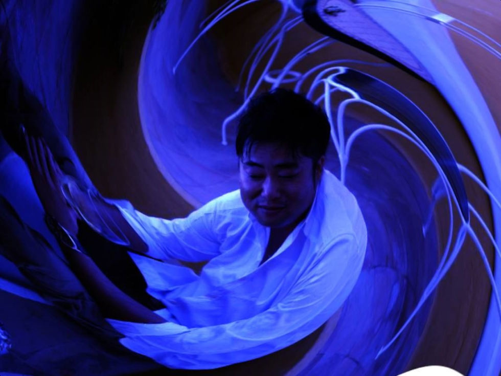 Japanese DJ Marcy in a swirl effect photo, colour image.