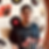 DJ and producer JAUSH standing in front of a wall decorated with vinyl records and album artwork, wearing glasses, a backwards cap and a La Familia T-shirt. His music spans House, Tech House and Minimal and Deep Tech.