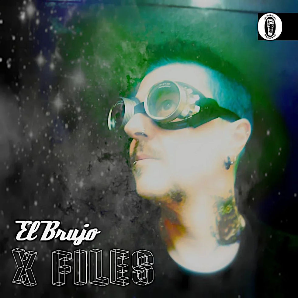 Italian DJ and producer El Brujo standing looking up to right wearing goggles on the X files release cover for Jambalay Records, colour image.