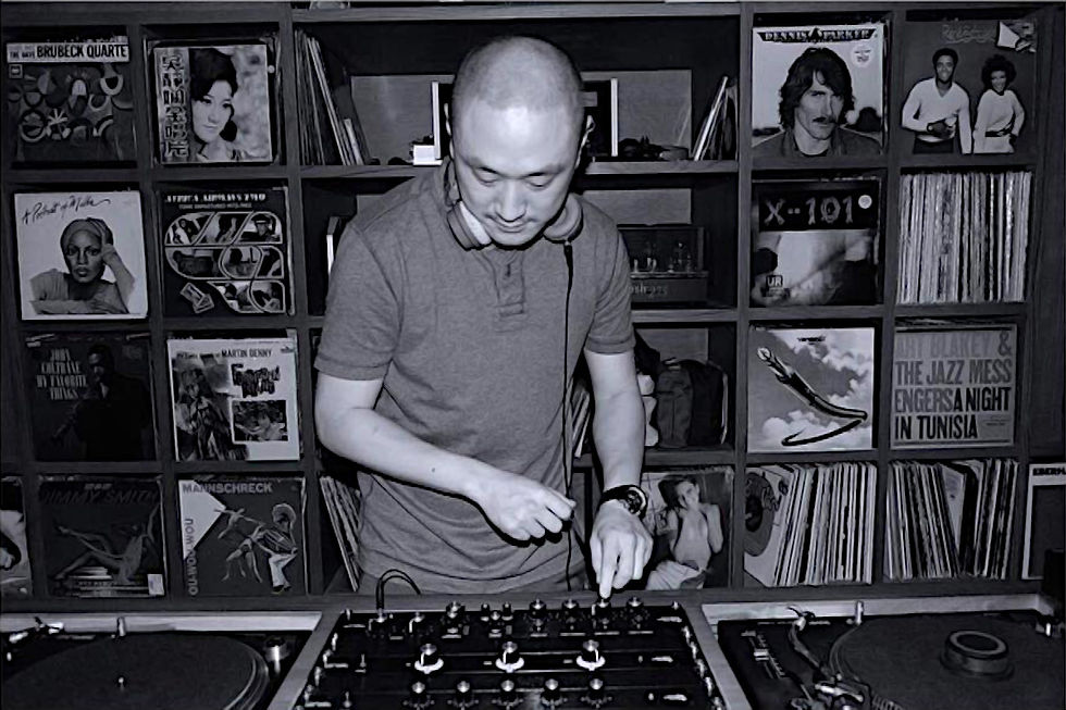 Taiwanese DJ and label owner Murphy Kin a.k.a DJ Lucy performing at Potato Head in Hong Kong, black and white image.