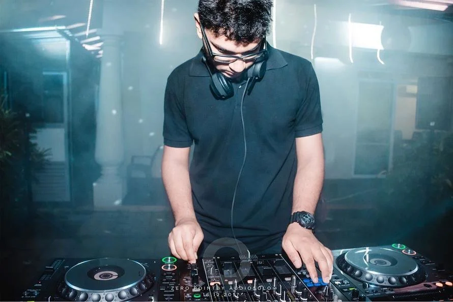 Sri Lankan DJ and producer Kryptone performing as a DJ at an event on Pioneer DJ equipment.