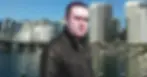 Portuguese DJ and producer Joshua standing in Darling Harbour, Sydney, Australia, wearing a leather jacket, a colour image.