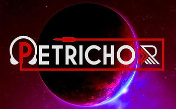 Petrichor logo in front of planet during an eclipse, colour image.
