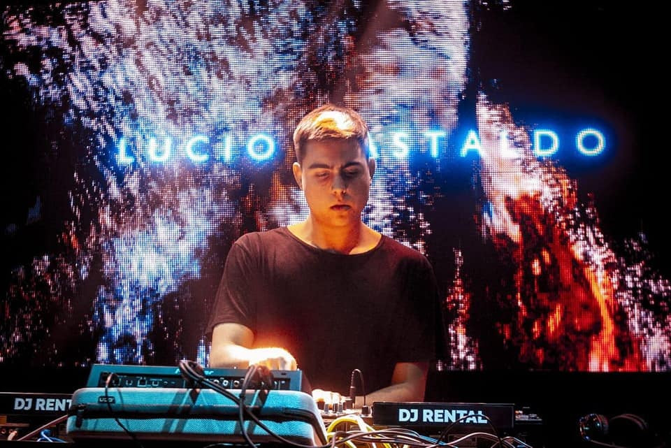 Argentinian DJ and producer Lucio Gastaldo performing at an event, colour image.