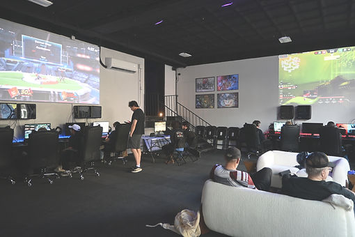 Friends gaming together at Goat Gamers Lounge in Pittsburgh