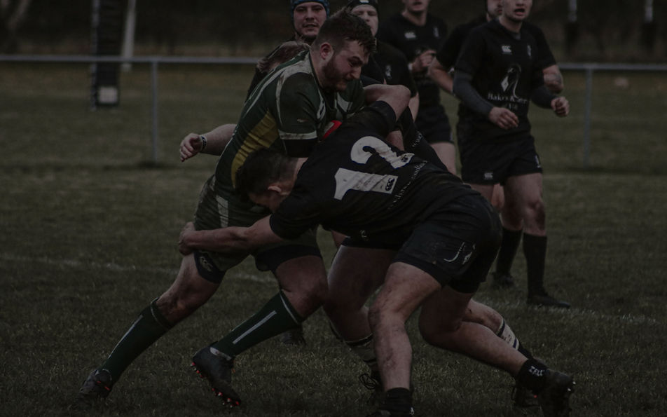 Rugby rackle with the shoulder