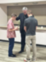 Bishop Peter F. Christensen prays over 16-year-old Owen Keith at St. Pius X Catholic Church in Coeur d’Alene on May 8th. Keith approached Bishop Peter seeking a blessing for his younger brother William (left) and himself (right) in preparation for the Eucharistic procession later in the month. (Courtesy photo/Jason Chavez)