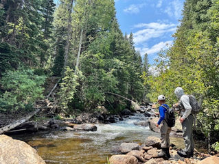 Kids fly fishing in Estes Park with guides from Lost Outfitters.