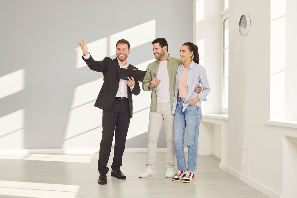 Estate agent viewing a property with clients