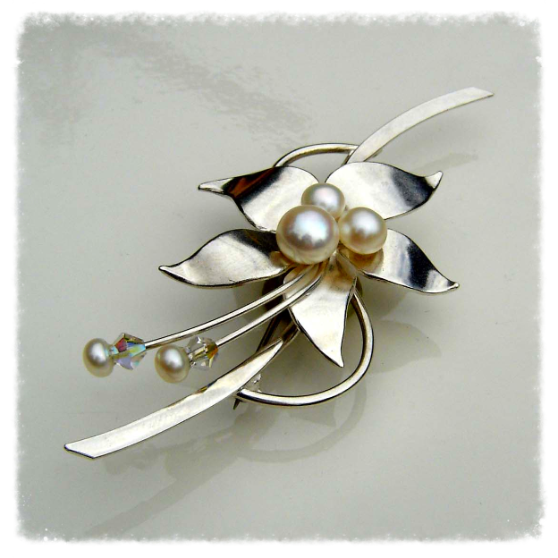 Silver floral brooch
