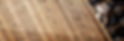 Ariel view of a man installing a wood deck.