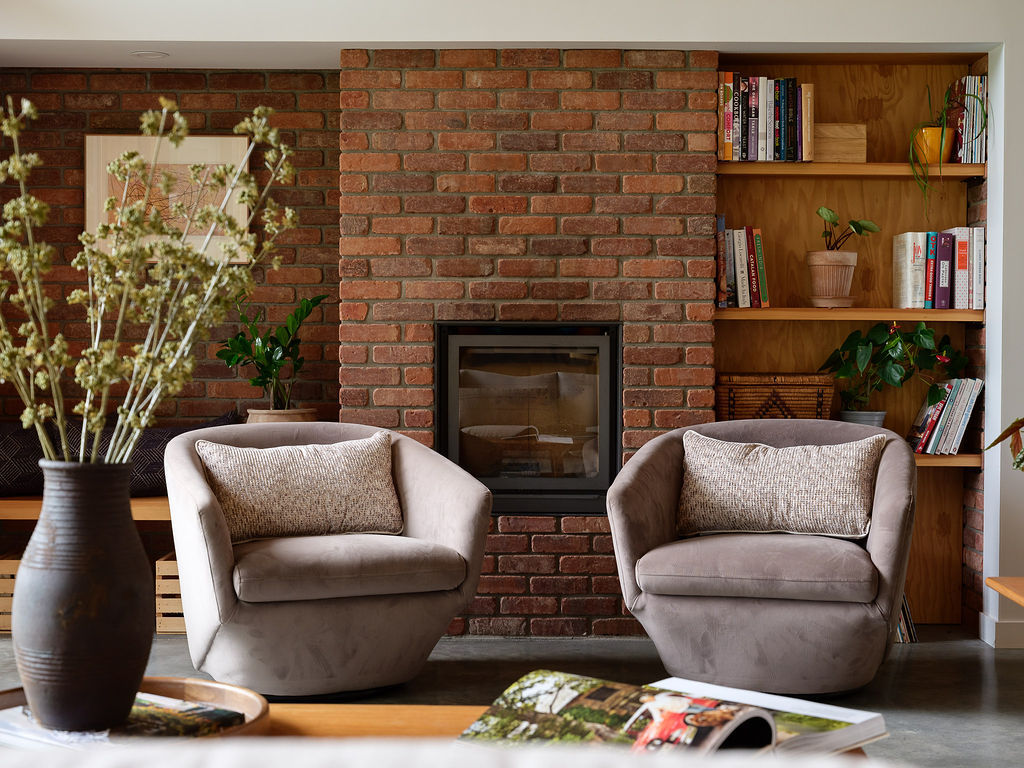 Julie Walters Interiors design consulting project - modern kitchen styling with sage tile backsplash, orange kettle, and layered natural textures for a warm, functional space.