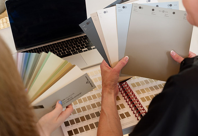 colour consultant reviewing interior paint samples in a Penticton Okanagan home