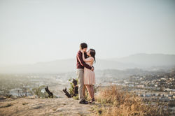Couple embracing on mountain top