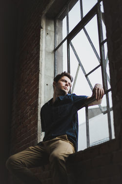Man waiting and searching at the window