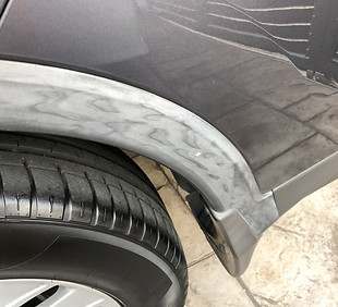 Faded car trim and bumper example