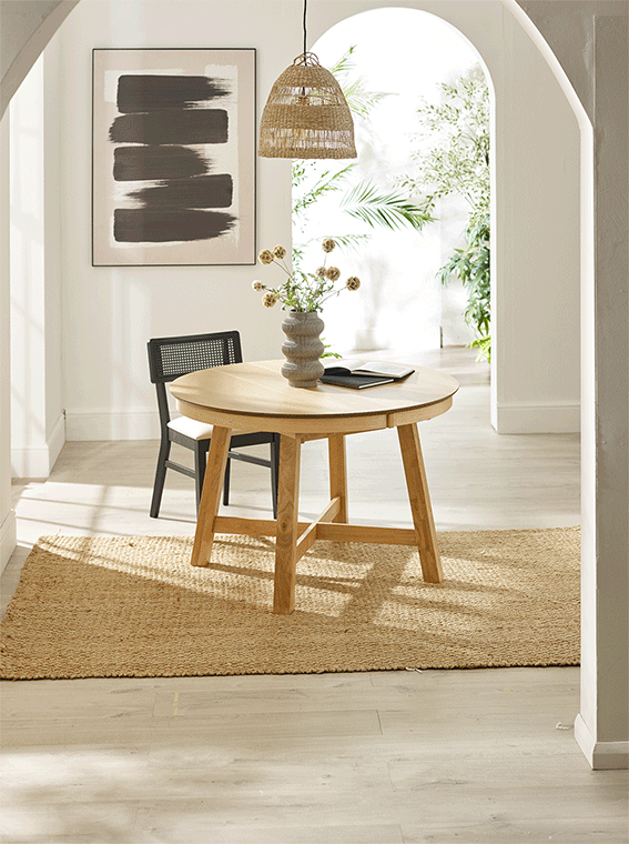 Black table and chairs in a dining room