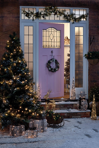 Pink door with a Christmas tree