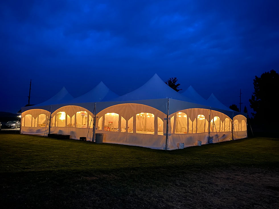 Thumbnail: Lighted 1600 sq. ft. High Peak Tent at a wedding in Spokane, WA.