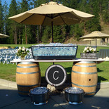 Beverage station set up at an outdoor wedding