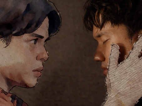 Two young people face to face in close-up, one cupping the other’s cheek, with a tense, intimate mood on a plain dark background in a still from the 2026 Puregold CinePanalo Film Festival Supernatural Romance film “Patay Gutom”.