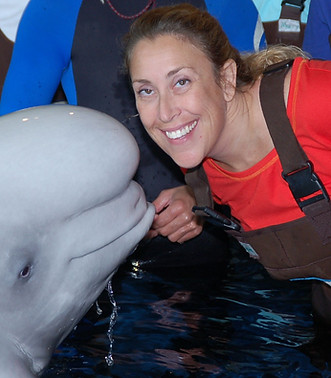 Cheryl Mell realtionship coachwith beluga.jpg