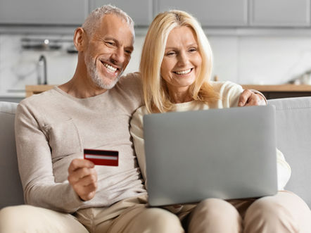 Happy couple shopping online